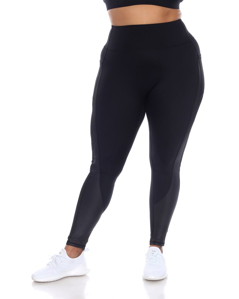 Back of a model wearing a size 2X High-Waist Mesh Fitness Leggings in Black by White Mark. | dia_product_style_image_id:249481